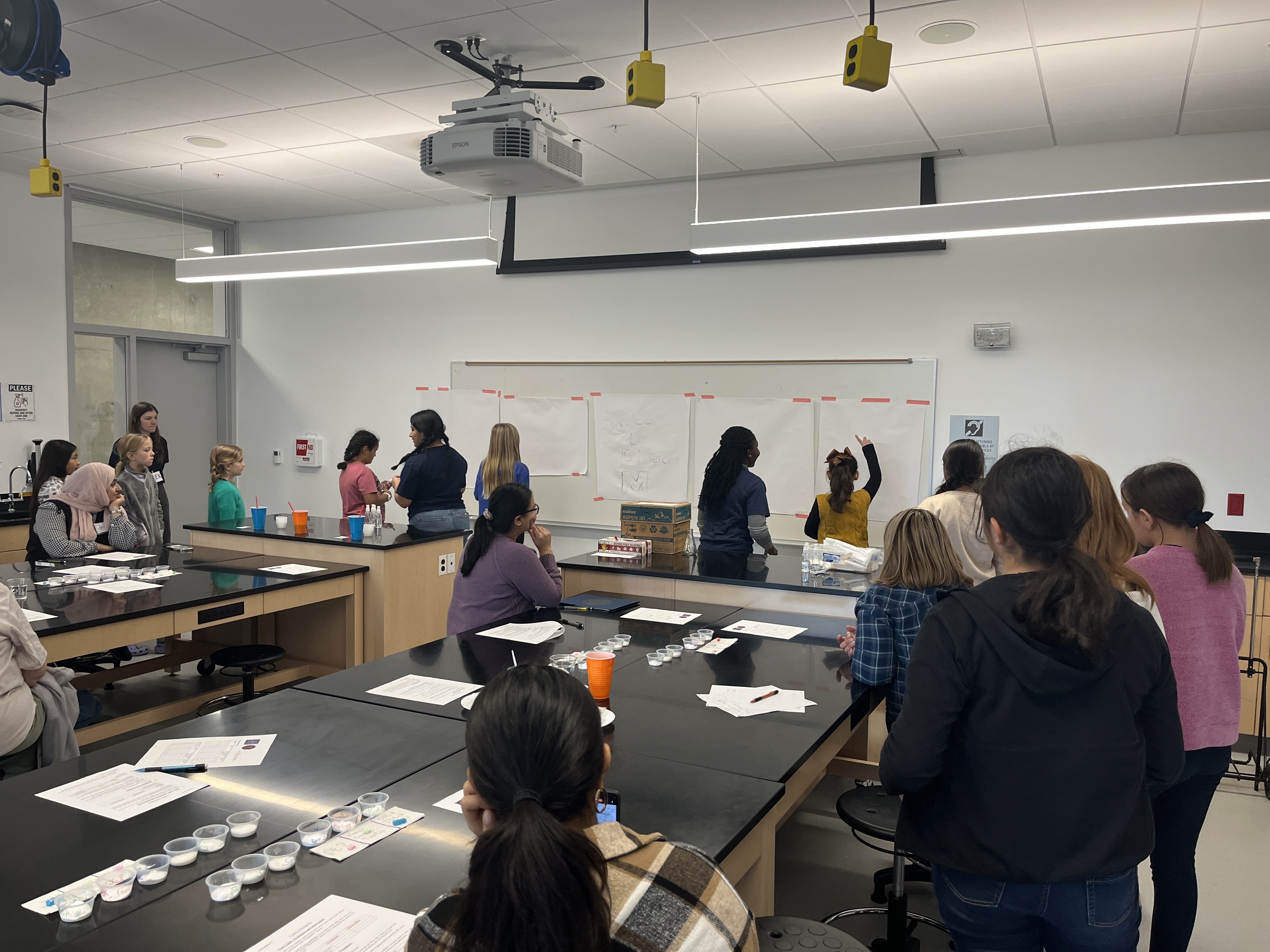 Abigail and Brianna Volunteer at Mother-Daughter Science Camp