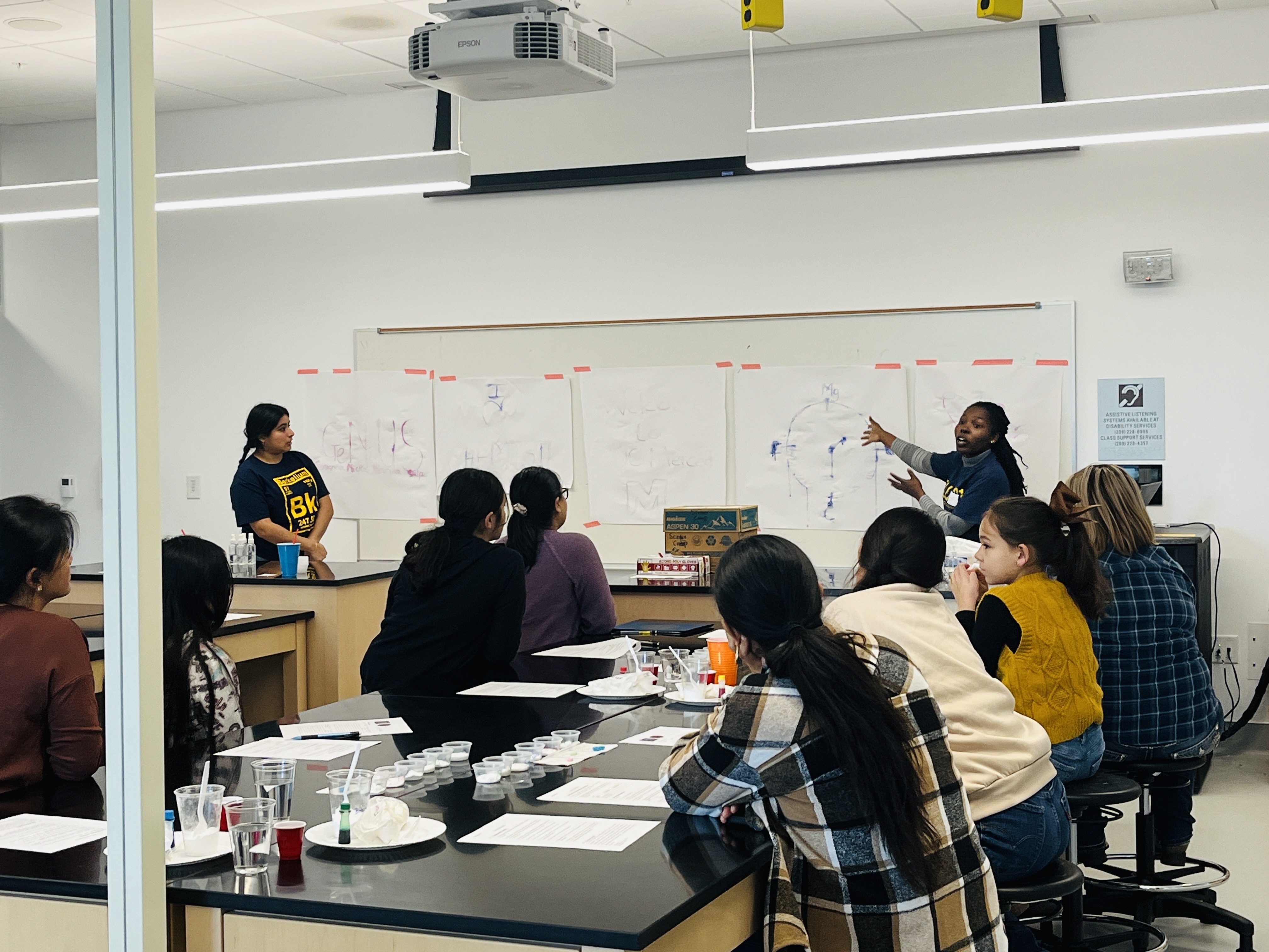 Abigail and Brianna Volunteer at Mother-Daughter Science Camp