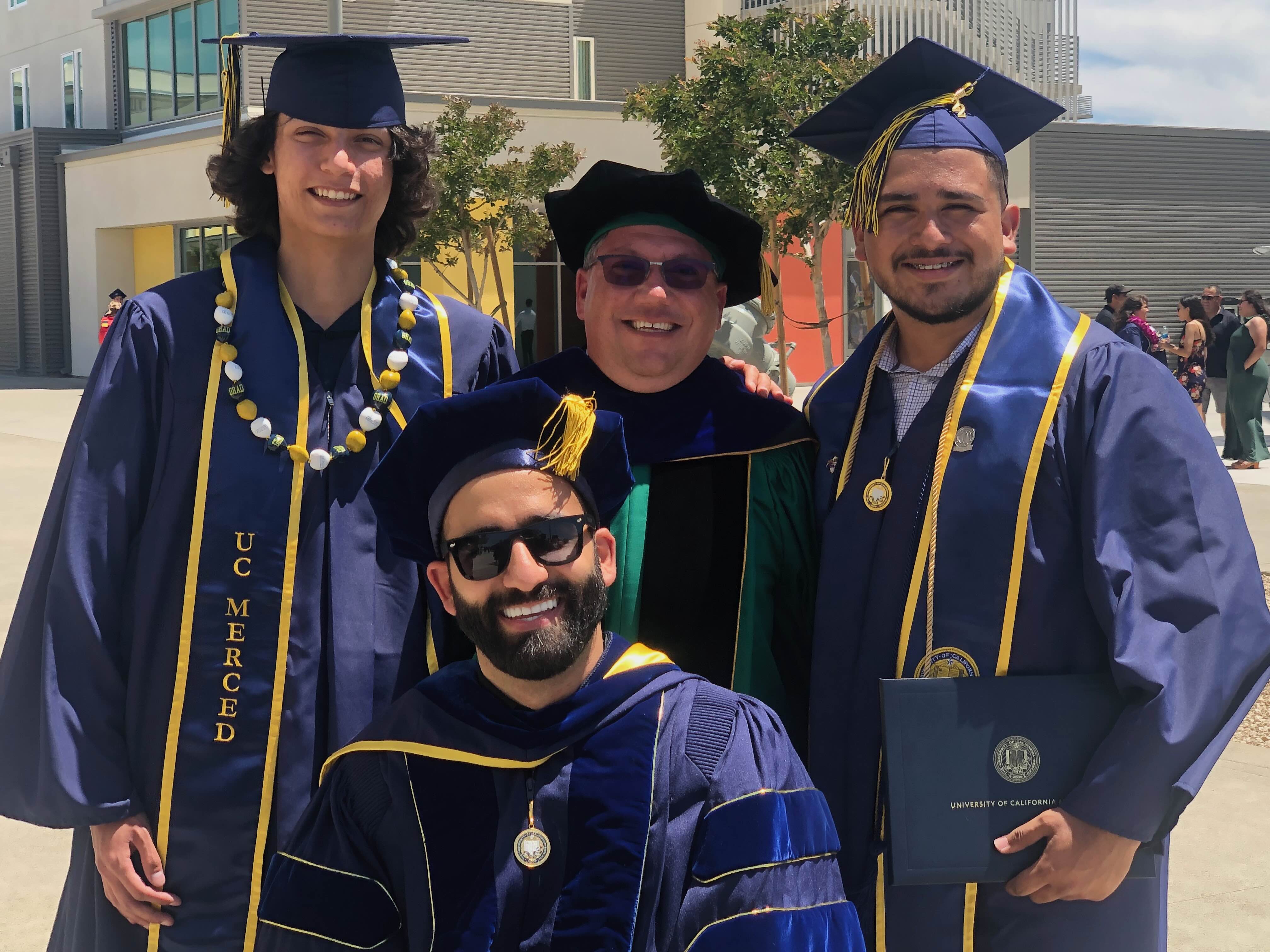 Ali, Jorge, and Jonathan Walk at Commencement